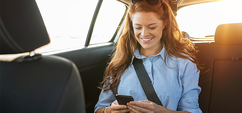 Casual woman using smartphone