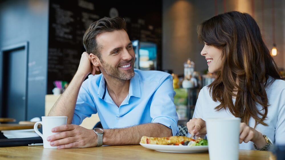 Beautiful couple having a great time at lunch date