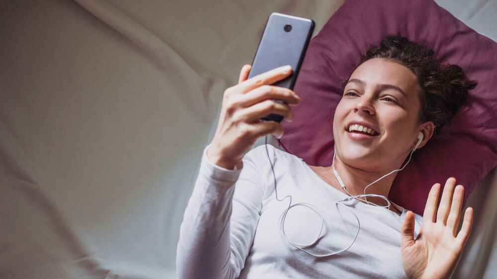 happy young woman on facetime